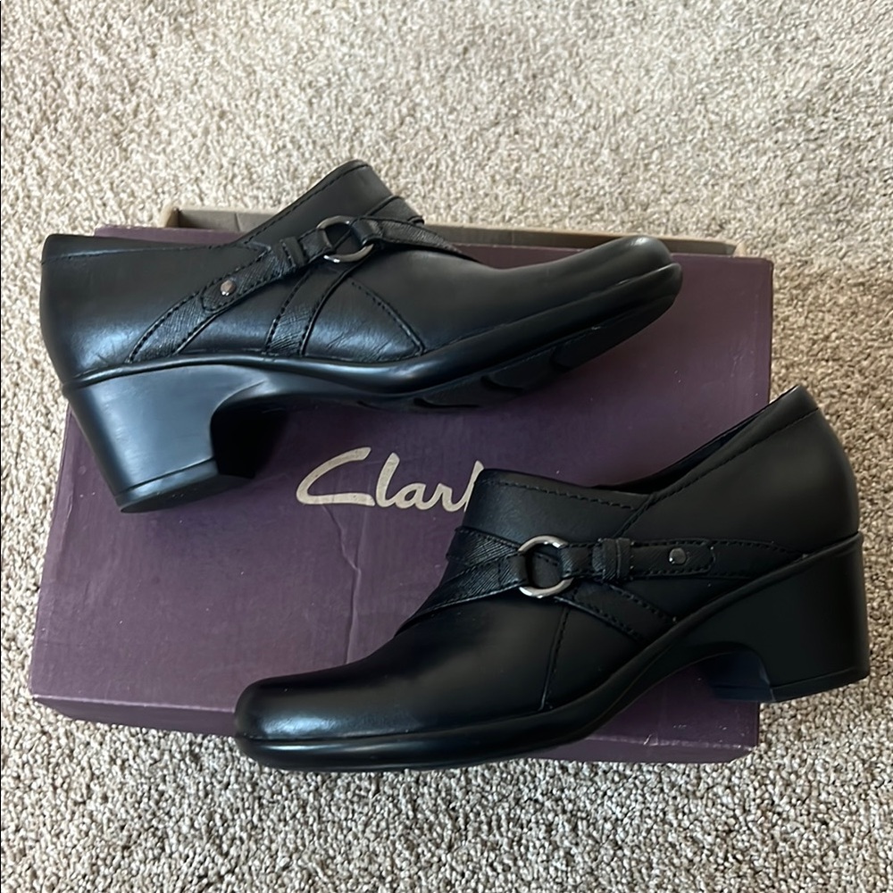 Clarks Black Heeled Shoes with Sleek Design
